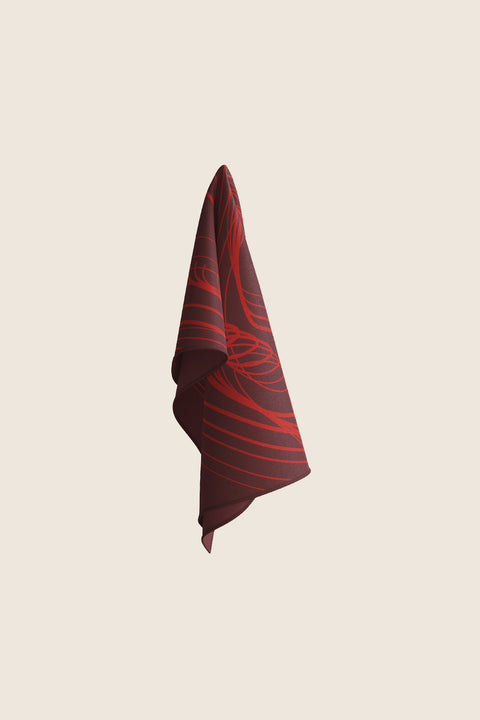 Discover a silk scarf with an original rose design by UMIAR jewellery, where expressive lines form a unique floral composition. Contrasting shades of red, burgundy, and carmine combine elegance with contemporary trends. This exceptional scarf, made from 100% natural silk, is part of the PROFONDO ROSSO collection. A perfect gift — beautifully packaged and ready to delight. Explore unique jewellery and silk scarves by UMIAR.