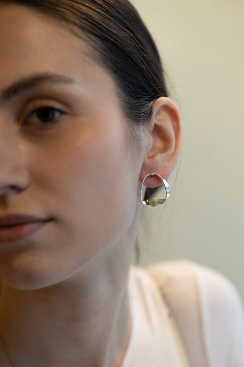 UMIAR jewellery FEMINA stud earrings with natural matcha jasper. Minimal, sculptural design inspired by feminine intimacy and balance. Limited edition. Choose jewellery that celebrates her power.