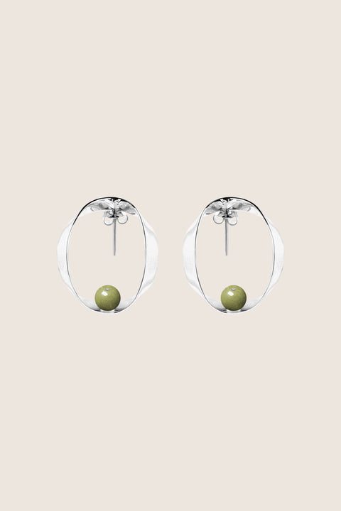 UMIAR jewellery FEMINA stud earrings with natural matcha jasper. Minimal, sculptural design inspired by feminine intimacy and balance. Limited edition. Choose jewellery that celebrates her power.
