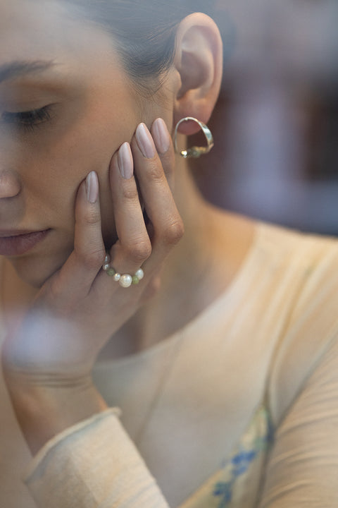 UMIAR jewellery FEMINA stud earrings with natural matcha jasper. Minimal, sculptural design inspired by feminine intimacy and balance. Limited edition. Choose jewellery that celebrates her power.
