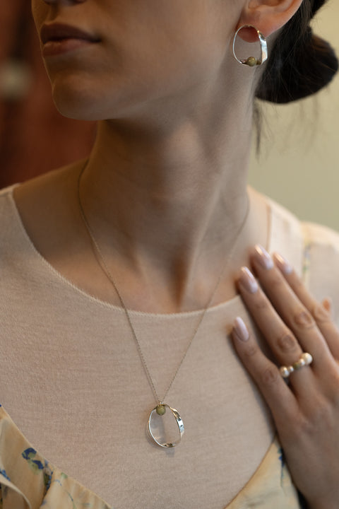UMIAR jewellery FEMINA necklace with natural matcha-toned jasper. A symbol of feminine strength, authenticity and balance. Limited UMIAR x MOYA MATCHA edition. Discover and gift timeless elegance.