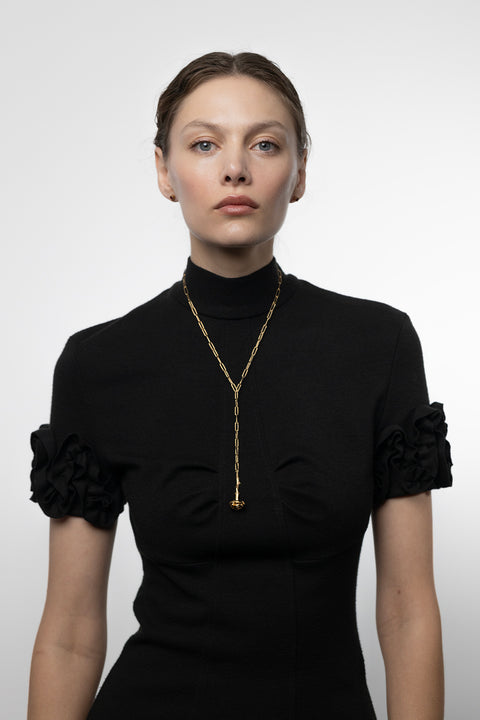 Discover an exceptional long lariat-style necklace from UMIAR jewellery, composed of two chains encircling the neck and ending in an elegant rose-shaped pendant. Handcrafted from precious materials — 925 sterling silver and 925 silver plated with 24-carat gold. Part of the PROFONDO ROSSO collection, inspired by the beauty of the rose, this design serves as a striking accent to any outfit. Add this unique necklace to your jewellery collection and highlight your distinctive style.