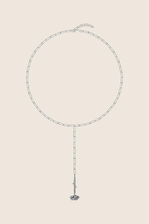 Discover an exceptional long lariat-style necklace from UMIAR jewellery, composed of two chains encircling the neck and ending in an elegant rose-shaped pendant. Handcrafted from precious materials — 925 sterling silver and 925 silver plated with 24-carat gold. Part of the PROFONDO ROSSO collection, inspired by the beauty of the rose, this design serves as a striking accent to any outfit. Add this unique necklace to your jewellery collection and highlight your distinctive style.