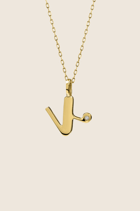 A delicate letter K pendant necklace inlaid with a natural diamond of 0.007 ct and 1.2 mm diameter. Suspended on a 50 cm chain, this timeless initial design offers a personal and elegant way to celebrate someone special. A refined keepsake that never goes out of style. Discover meaningful jewelry by UMIAR jewelry.