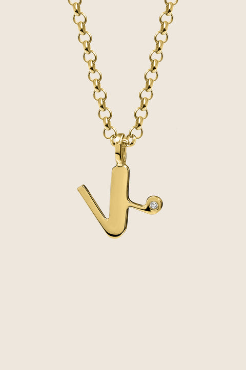 A delicate letter K pendant necklace inlaid with a natural diamond of 0.007 ct and 1.2 mm diameter. Suspended on a 50 cm chain, this timeless initial design offers a personal and elegant way to celebrate someone special. A refined keepsake that never goes out of style. Discover meaningful jewelry by UMIAR jewelry.