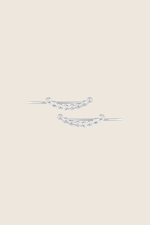 UMIAR jewellery presents monolithic earrings adorned with precious gemstones such as diamonds and topazes. A minimalist design with no clasps, handcrafted from 925 sterling silver or 24-carat gold-plated silver. Discover a new level of comfort and style — order yours today!
