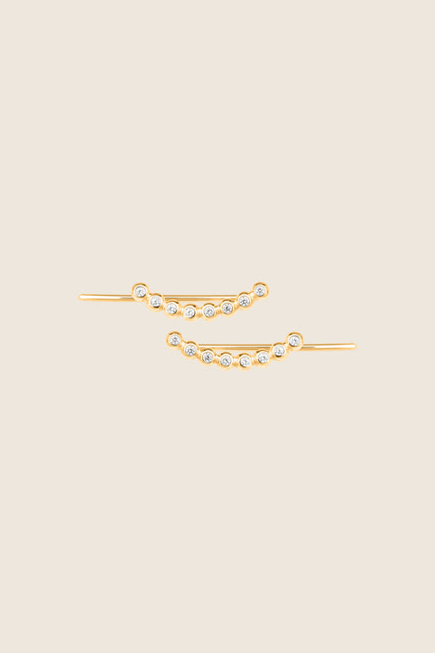 UMIAR jewellery presents monolithic earrings adorned with precious gemstones such as diamonds and topazes. A minimalist design with no clasps, handcrafted from 925 sterling silver or 24-carat gold-plated silver. Discover a new level of comfort and style — order yours today!