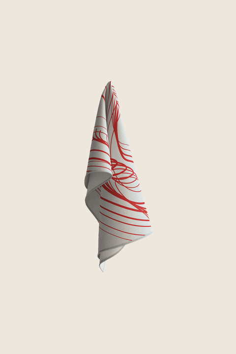 Discover a silk scarf with an original rose design by UMIAR jewellery, where expressive lines form a distinctive floral composition. Contrasting shades of ecru and carmine blend elegance with modern style. This exceptional scarf, made from 100% natural silk, is part of the PROFONDO ROSSO collection. A perfect gift — beautifully packaged and ready to delight. Explore unique jewellery and silk scarves by UMIAR.