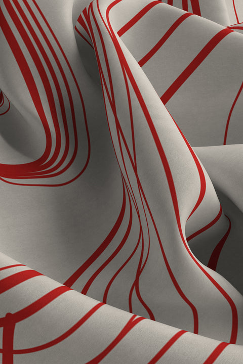 Discover a silk scarf with an original rose design by UMIAR jewellery, where expressive lines form a distinctive floral composition. Contrasting shades of ecru and carmine blend elegance with modern style. This exceptional scarf, made from 100% natural silk, is part of the PROFONDO ROSSO collection. A perfect gift — beautifully packaged and ready to delight. Explore unique jewellery and silk scarves by UMIAR.