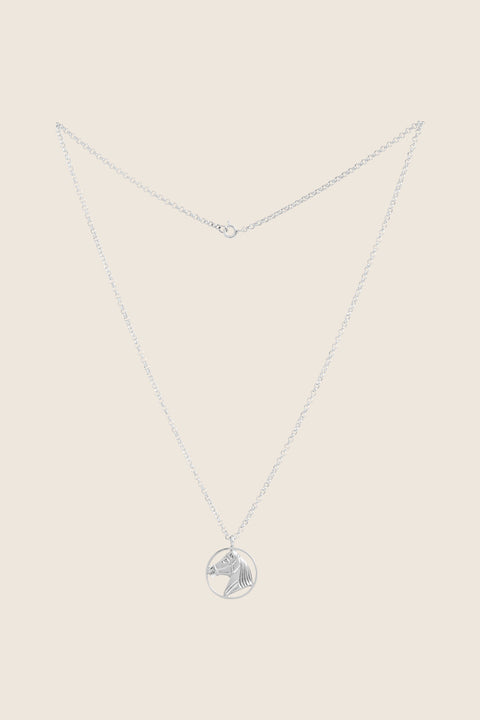 This elegant necklace with a double-sided sculpted horse pendant is a distinctive piece that embodies strength, freedom and timeless elegance. It subtly enhances everyday looks, becoming a personal talisman for those who appreciate refined style. Available in sterling silver and gold-plated sterling silver. Discover UMIAR jewelry and order online.