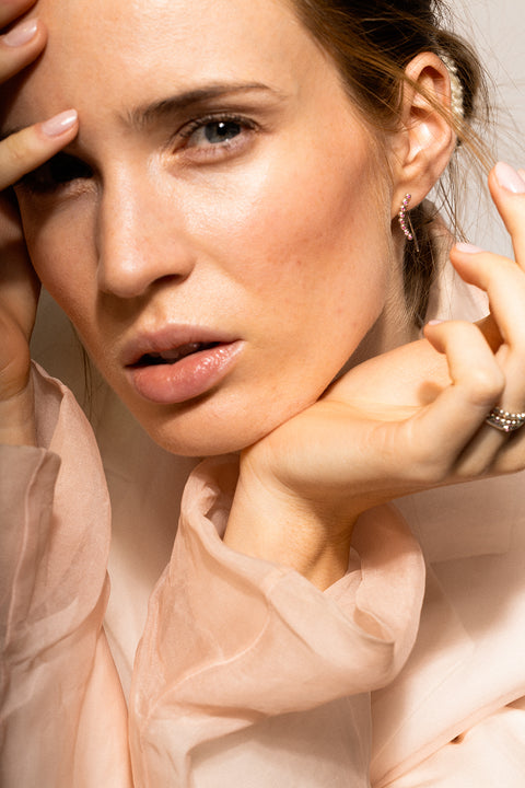UMIAR jewellery presents monolithic earrings adorned with precious gemstones such as diamonds and topazes. A minimalist design with no clasps, handcrafted from 925 sterling silver or 24-carat gold-plated silver. Discover a new level of comfort and style — order yours today!