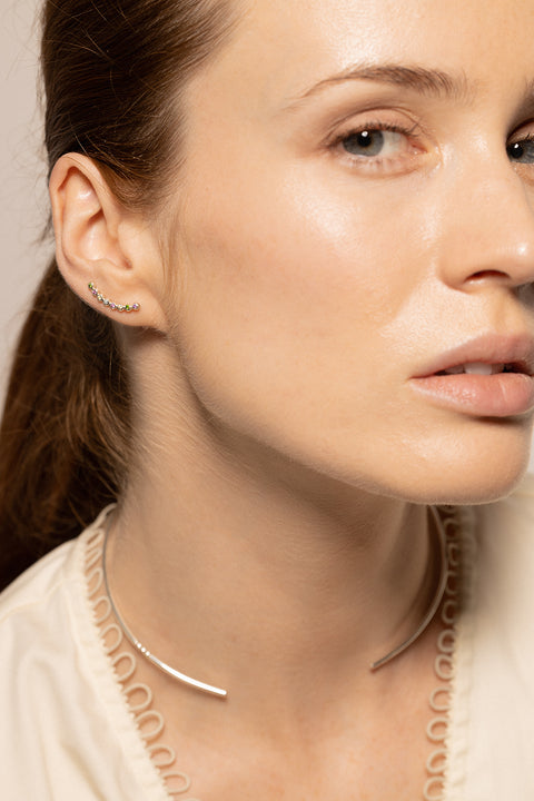 UMIAR jewellery presents monolithic earrings adorned with precious gemstones such as diamonds and topazes. A minimalist design with no clasps, handcrafted from 925 sterling silver or 24-carat gold-plated silver. Discover a new level of comfort and style — order yours today!