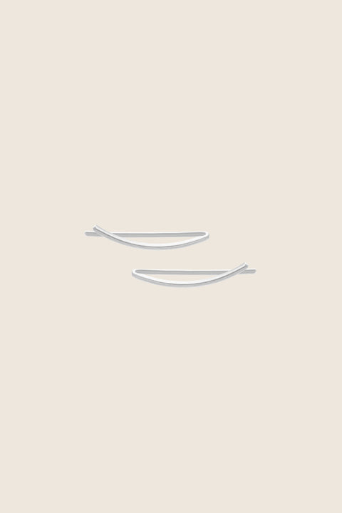 Lightweight, monolithic threader earrings made from fine wire—one of UMIAR’s first and most iconic designs. Minimalist, comfortable, and timeless, they reflect the essence of modern simplicity. Easy to wear and perfect as a thoughtful gift. Discover enduring minimalism by UMIAR jewelry.