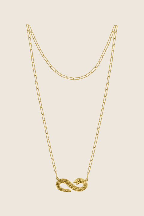 A distinctive necklace featuring a snake-shaped pendant forming the infinity symbol. With pendant dimensions of 15 x 39 mm, this design blends powerful symbolism with elegant craftsmanship. A meaningful and expressive accessory for everyday wear or special occasions. Discover symbolic elegance by UMIAR jewelry.