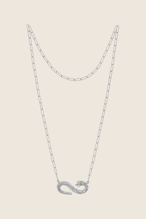 A distinctive necklace featuring a snake-shaped pendant forming the infinity symbol. With pendant dimensions of 15 x 39 mm, this design blends powerful symbolism with elegant craftsmanship. A meaningful and expressive accessory for everyday wear or special occasions. Discover symbolic elegance by UMIAR jewelry.