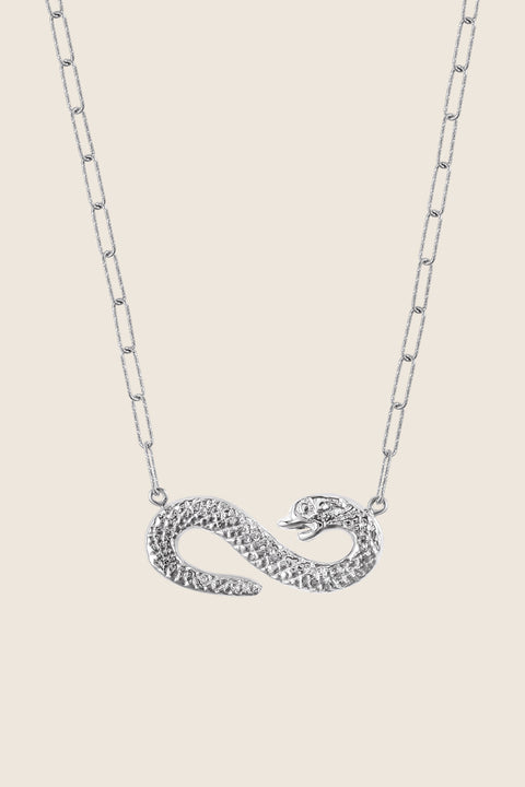 A distinctive necklace featuring a snake-shaped pendant forming the infinity symbol. With pendant dimensions of 15 x 39 mm, this design blends powerful symbolism with elegant craftsmanship. A meaningful and expressive accessory for everyday wear or special occasions. Discover symbolic elegance by UMIAR jewelry.
