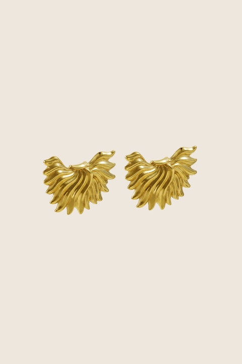 Decorative flame-shaped earrings inspired by vintage aesthetics and modern design. Symbolizing strength, courage, and love, they are bold yet lightweight, offering expressive elegance with natural ease. Measuring 20 × 30 mm, they create a striking statement for special occasions. Discover powerful design by UMIAR jewelry.