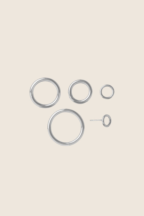 Modular hoop earrings designed for creative styling and personal expression. Featuring connected hoops of different sizes with openable main elements, they allow you to customize, layer, and transform your look freely. A versatile, design-forward piece for modern jewelry lovers. Discover creative freedom with UMIAR jewelry.