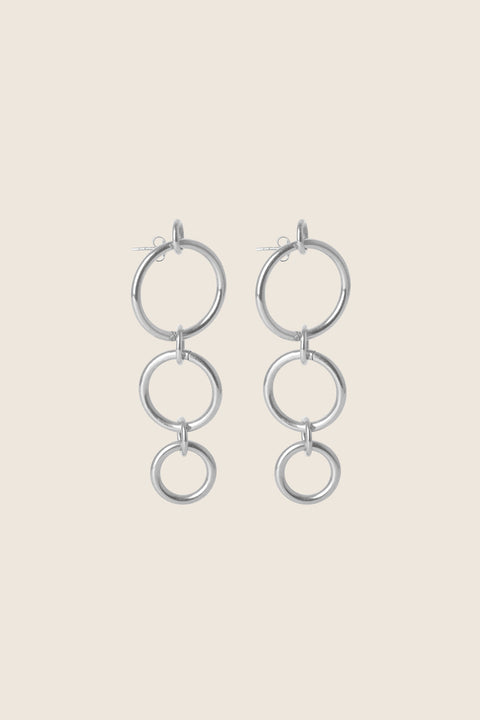 Modular hoop earrings designed for creative styling and personal expression. Featuring connected hoops of different sizes with openable main elements, they allow you to customize, layer, and transform your look freely. A versatile, design-forward piece for modern jewelry lovers. Discover creative freedom with UMIAR jewelry.