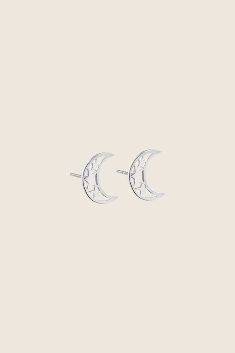 Moon-shaped stud earrings accented with star details combine vintage charm with a timeless astral motif. Measuring 17 × 14 mm, they can be worn vertically or horizontally for versatile styling. Elegant worn alone or layered with MUUN necklaces. Discover celestial elegance by UMIAR jewelry.