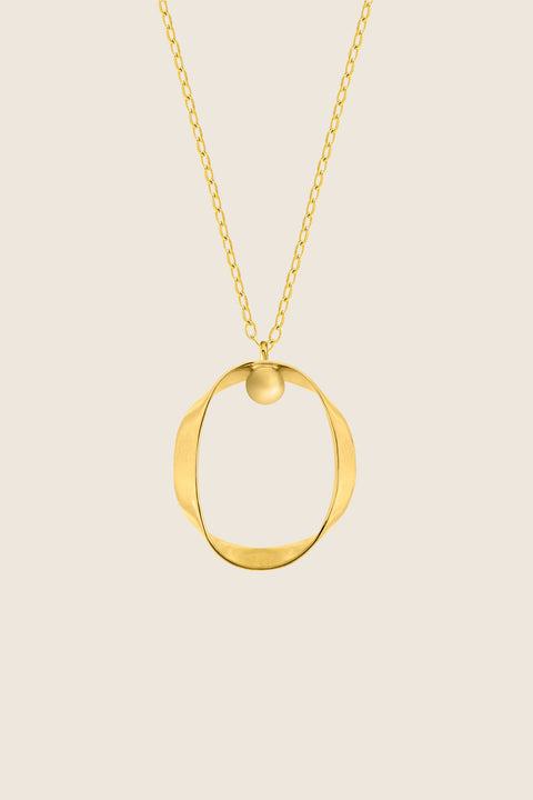 A minimalist silver pendant inspired by feminine intimacy, designed as a sculptural, three-dimensional form made from a softly contoured ribbon. Suspended on a 50 cm silver chain, it celebrates the beauty of the body through symbolic design and refined craftsmanship. Discover expressive elegance by UMIAR jewelry.