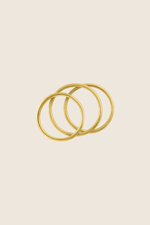 A refined set of three delicate band rings designed for versatile styling—wear them individually, stacked, or as knuckle rings. Minimalist and elegant, they offer endless combinations and effortless everyday wear. A perfect choice for lovers of subtle design and adaptable jewelry. Discover modern versatility by UMIAR jewelry.