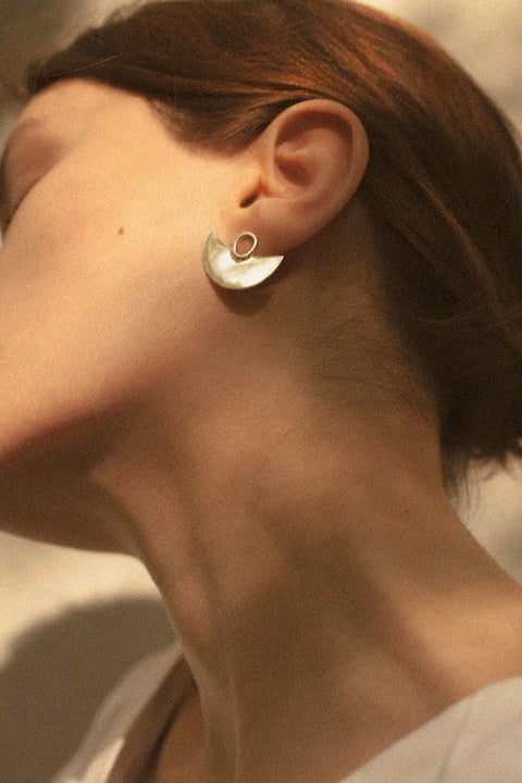 Stud earrings inspired by the rich culture of South America, handcrafted from sterling silver or 24k gold-plated silver. Part of the ESTAS collection, they celebrate nature, exotic travel, and the free-spirited energy of the modern nomad. Discover adventurous elegance by UMIAR jewelry.