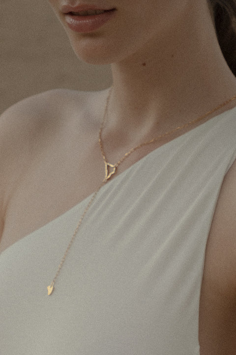 Discover a distinctive necklace from UMIAR jewellery that takes you on a journey to sun-drenched Capri. Handcrafted from 925 sterling silver and 24-carat gold-plated silver, this unique piece features two pendants inspired by the island’s topography and three chains that gracefully wrap around the neck, cascading down the neckline. The total length is 53 cm, with a 10 cm opposite chain. More than just an accessory — it’s a tribute to the beauty and spirit of Capri.
