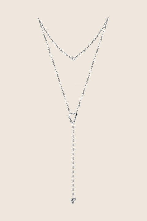 Discover a distinctive necklace from UMIAR jewellery that takes you on a journey to sun-drenched Capri. Handcrafted from 925 sterling silver and 24-carat gold-plated silver, this unique piece features two pendants inspired by the island’s topography and three chains that gracefully wrap around the neck, cascading down the neckline. The total length is 53 cm, with a 10 cm opposite chain. More than just an accessory — it’s a tribute to the beauty and spirit of Capri.