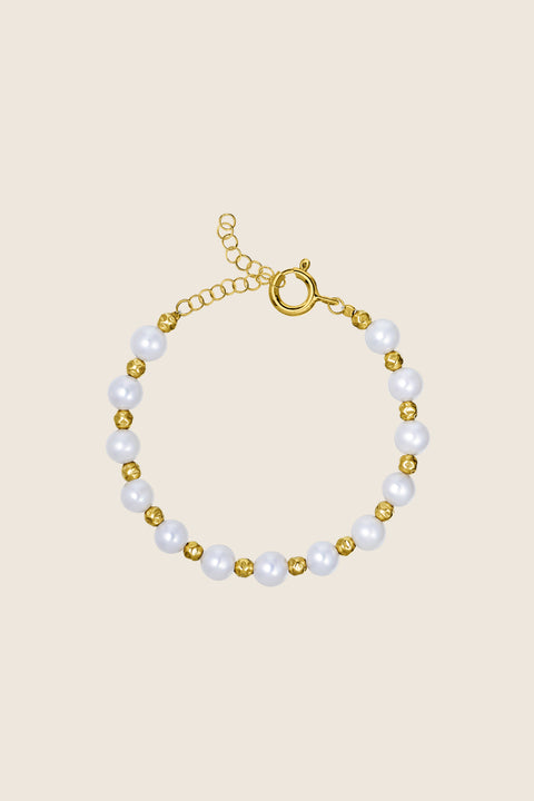 Discover the delicate bracelet from UMIAR Jewellery’s MÉLANGÉ collection, crafted from alternating natural pearls and small round beads. Its elegant design complements any outfit effortlessly. Made from high-quality materials, it is available in two versions: 925 sterling silver and 24k gold-plated silver. The MÉLANGÉ collection blends the ease of beaded jewellery with the refinement of pearls, gold and silver, creating perfect harmony in every detail.