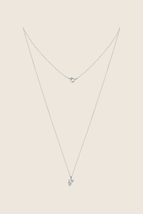 Discover the delicate Capri-inspired pendant necklace by UMIAR Jewellery. Handcrafted in 925 sterling silver and 24k gold-plated silver, it features a subtle 0.007 ct diamond that adds refined brilliance. A luxurious accent from the CAPRI collection — perfect for everyday elegance and a touch of dolce vita. Explore now!