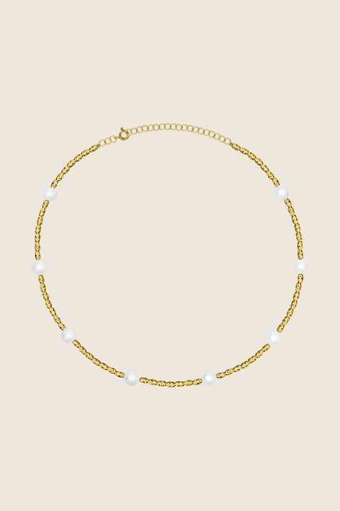 Discover the extraordinary necklace by UMIAR Jewellery, combining irregularly textured silver beads with delicate natural pearls. This piece radiates elegance and distinctive style, beautifully highlighting your personal character. Available in two versions: 925 sterling silver and 24k gold-plated 925 silver. Treat yourself to a touch of luxury — a unique addition to your jewellery collection. Shop now!