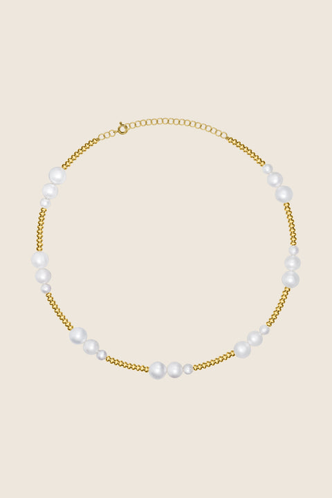 Elevate your style with the TALONA necklace from UMIAR Jewellery’s MÉLANGÉ collection. Handcrafted from irregular silver beads and natural pearls, it offers a refined yet effortless charm that suits any look. Available in 925 sterling silver and 24k gold-plated silver, this design blends the lightness of beaded jewellery with the sophistication of premium materials. Explore the harmony and balance that define MÉLANGÉ.