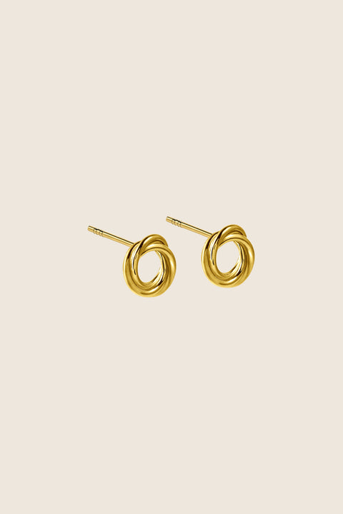 Discover the small, delicate stud earrings shaped as a rosette woven from tiny links, handcrafted from premium materials: 925 sterling silver and 24k gold-plated silver. Part of UMIAR Jewellery’s WIĘZI collection — inspired by the desire to create unifying emotions — these earrings are designed for both her and him, celebrating the connections that form something whole and beautiful.