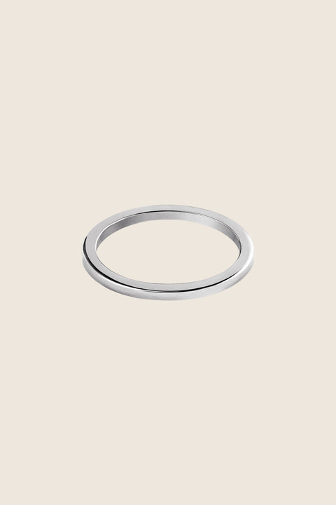 Discover the delicate square-profile ring from UMIAR Jewellery, handcrafted in 925 sterling silver or 24k gold-plated silver. Perfect worn solo or stacked with other rings. Its subtle elegance and minimalist design make it an ideal choice for anyone who appreciates refined, timeless style. Add a unique accent to your collection — shop now and enjoy its enduring beauty!