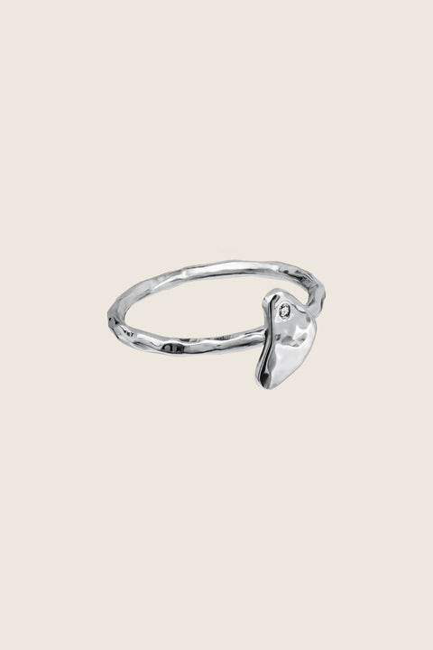 Discover the delicate ring by UMIAR Jewellery, inspired by the topography of Monte Solaro on Capri. Handcrafted in 925 sterling silver and 24k gold-plated silver, it is set with a 0.007 ct diamond. The CAPRI collection reflects the island’s sculpted landscape and mountain contours. Add a touch of dolce vita to your look. Explore now!