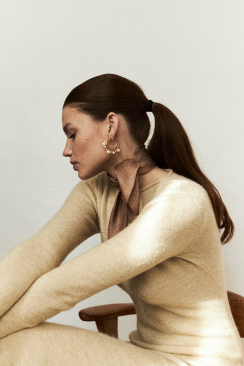 An elegant jewellery set by UMIAR Jewellery, featuring ARNO hoop earrings and the GEMINA attachment. Handcrafted in 925 sterling silver and 24k gold-plated silver, this duo offers versatile styling options, adding refined charm to any look. A unique and stylish accessory perfect for every occasion, designed to elevate your elegance. Add to cart now!