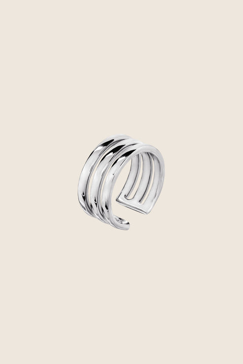 A striking ear cuff by UMIAR Jewellery, created from three interconnected rings, perfect for elevating any ear styling. Handcrafted in 925 sterling silver and 24k gold-plated silver, this unique piece blends elegance with modern design. Add a distinctive accent to your collection. Order now to highlight your individual style!