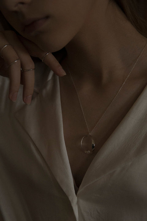 This thin, minimalist ring crafted in 14k gold features a subtle rounded profile and timeless simplicity. A bestselling design, it pairs beautifully with other rings — including the PLURES set — creating refined hand styling. It also makes a perfect discreet wedding band. Discover UMIAR jewelry.