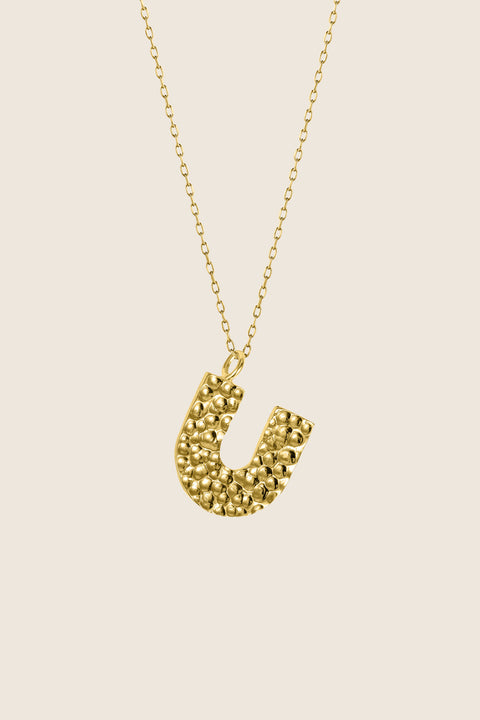 Add a touch of elegance to your collection with UMIAR jewelry. This U-shaped necklace with a hammered finish is handcrafted from 925 sterling silver or 925 sterling silver plated with 24-karat gold. Part of the WIĘZI Collection, it draws on traditional craftsmanship and open-work detailing. A unisex design created to celebrate meaningful connections.